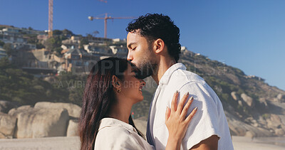 Buy stock photo Kiss, love and smile with couple on beach together for anniversary, date or honeymoon in summer. Affection, holiday and vacation with happy people outdoor in nature for bonding, security or travel