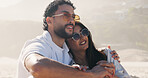 Vacation, hug and smile with couple on beach for travel, summer and holiday together. Sunglasses, man and woman with date for love, bonding and view for weekend break and relax for honeymoon trip