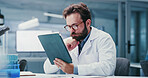 Scientist, reading or man with tablet in lab, online research paper or pathology trial study for info. Experiment results, review or researcher with vaccine development news, medical journal or tech