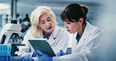 Buy stock photo Tablet, research and women in lab, discussion for experiment results and coaching. Science, mentor and people in meeting, teamwork and email for medical report and collaboration for biotech project
