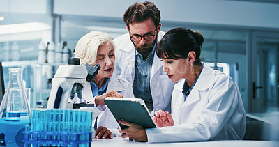 Buy stock photo Medical, science and tablet with people in laboratory together for development or research. App, talking and review with scientist team at work on clinical trial, experiment feedback or study