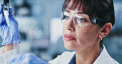 Buy stock photo Scientist, woman and pipette in lab with test tube, DNA experiment or evaluation for medical research. Mature person, science or sample review in clinic with equipment, healthcare trial or innovation