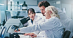 Science, people and discussion in lab with computer, manager advice and experiment for medical research. Scientist, team and review test results in clinic with pc, collaboration and healthcare study.