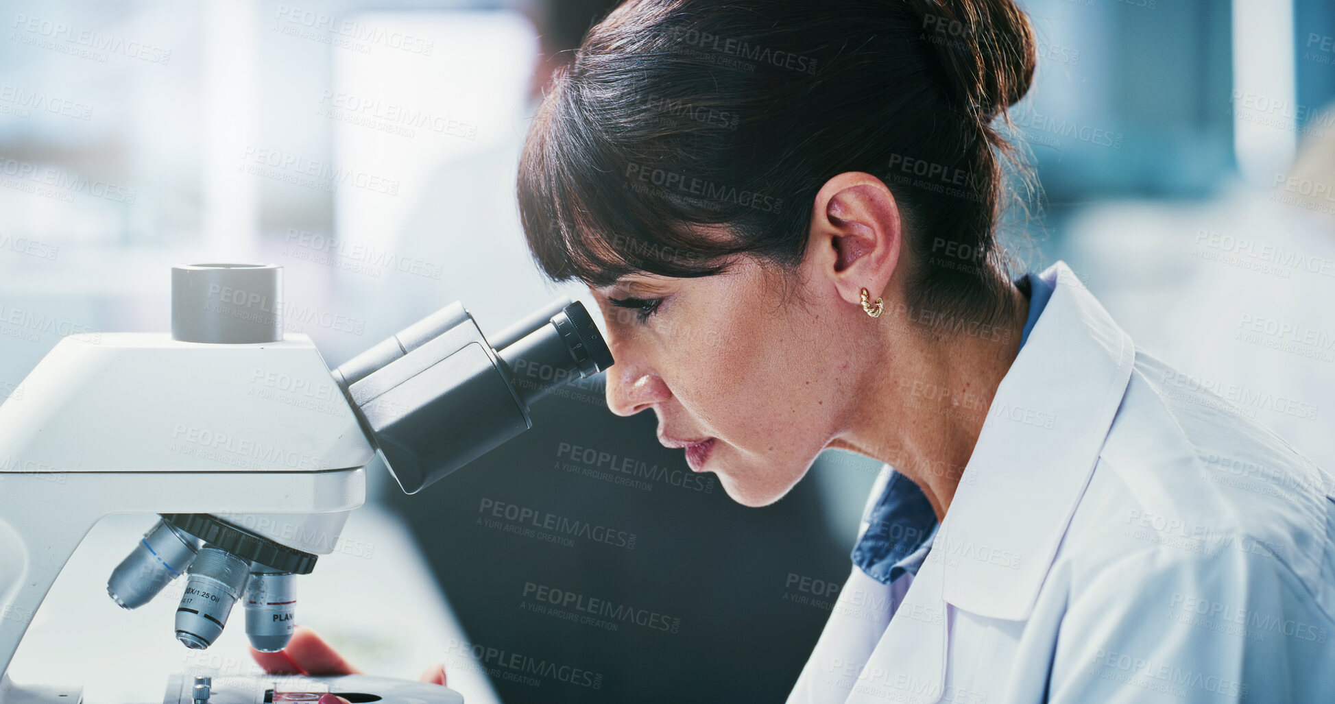 Buy stock photo Science, study or woman in lab with microscope, investigation or examination in biochemistry. Clinical research, review or scientist with equipment, medical analysis or inspection in rna development.