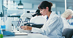 Microscope, woman and scientist in laboratory for pharmaceutical research, study or experiment. Biotechnology, professional and female biologist with clinical development for science innovation.