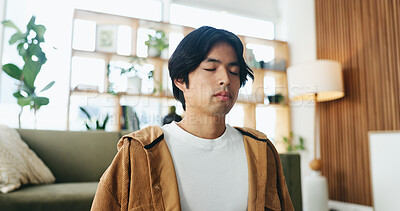 Buy stock photo Zen, man and meditation for inner peace in house, mindfulness and wellness with spiritual awareness. Calm, person and self care for mental health on break, mudra and healing with yoga and balance
