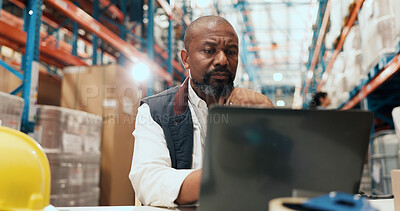 Buy stock photo Logistics, serious and man with laptop in warehouse, supply chain or stock quality assurance on web. Shipping, online and mature person with tech for order distribution, reading and inventory on app