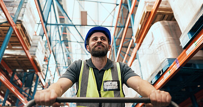 Buy stock photo Walking, shipping and man with trolley in warehouse for supply chain, inventory and stock inspection. Supervisor, low angle and person in aisle for logistics, ecommerce or distribution for cargo
