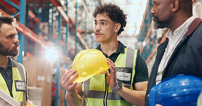 Buy stock photo Logistics, meeting and man in warehouse with helmet for safety, discussion and PPE. Protection, regulations and team with supervisor for storage, shipping and inspection for compliance with flare