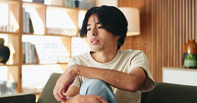 Buy stock photo Man, relax and thinking with Asian student on sofa in home living room for morning or weekend break. Comfortable, planning and vision with college or university pupil in apartment for education ideas