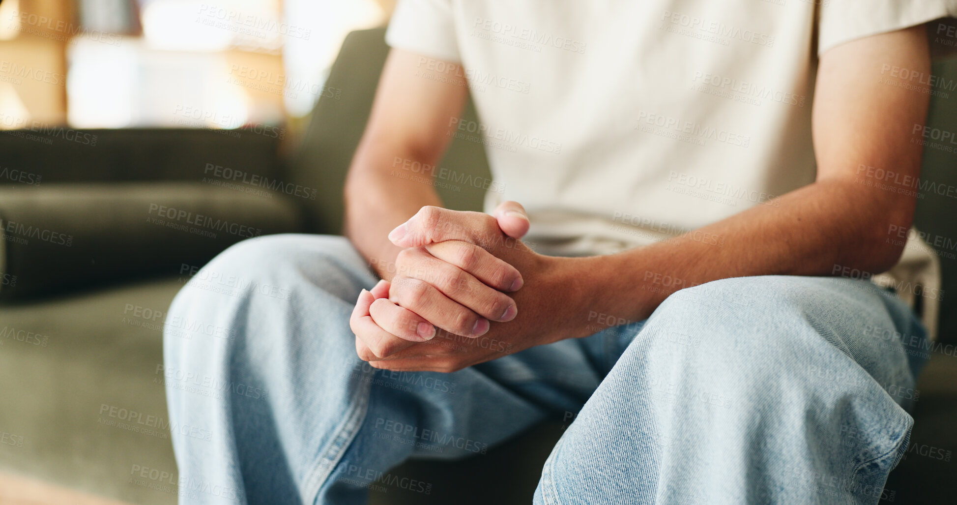 Buy stock photo Hands, nervous and therapy with person on sofa for guidance, grief or trauma counselling. Anxiety, concern and worry with patient in psychology session for communication, conversation or healing