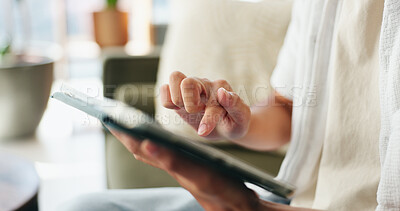 Buy stock photo Scroll, online and hands with tablet in lounge, remote work and editing videos for social media post. Creative, content creator and person with tech for thumbnail design, home and upload on website
