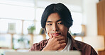 Creative, ideas and man with laptop in office, content creator and plan for video submission on web. Thinking, person and decision for social media thumbnail, reflection and preparing for upload