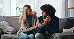 Therapy, happy and couple on sofa for conversation in counseling session, consulting and help. Psychology, dating and man with woman with support for strong relationship, communication and love