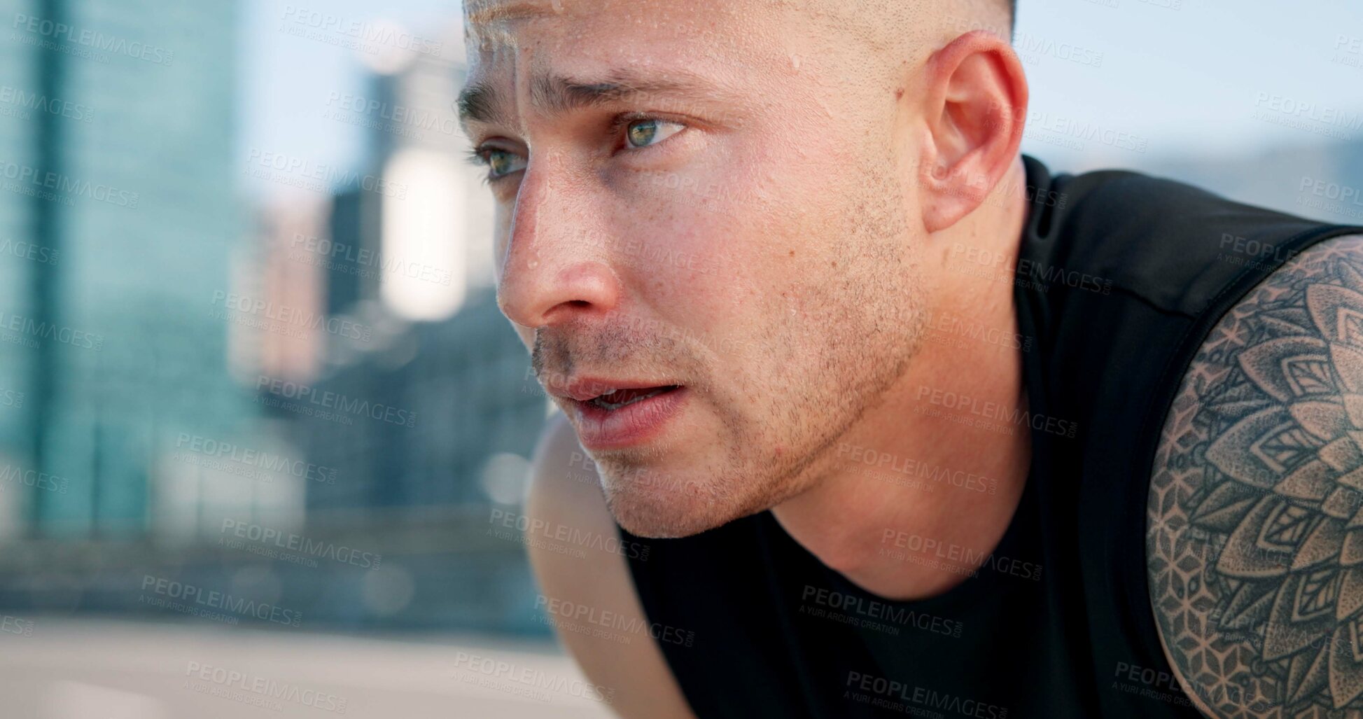 Buy stock photo Runner, tired and man in city breathe from exercise, workout and training with fatigue. Sports, athlete and person in town for rest, challenge and fitness for active hobby, wellness and health