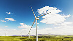 Blue sky, nature and wind turbine outdoor by grass for renewable energy, sustainable or eco friendly. Field, clouds and windmill for natural resource with economic development in countryside.