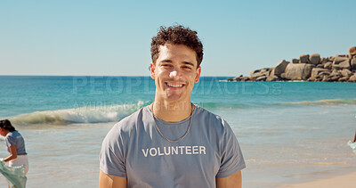 Buy stock photo Happy, man and portrait of volunteer on beach with confidence for social responsibility. Smile, NGO and male charity worker by ocean for community service with earth day project by sea conservation.