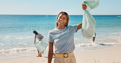 Buy stock photo Portrait, beach and woman with trash bag, volunteer for social responsibility and excited to recycle. Ocean, cleaning environment or person with plastic collection, sustainability or waste management