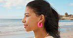 Woman, relax and thinking at beach with summer holiday, contemplation and weekend getaway for peace. Space, person and reflection outdoor by ocean with travel adventure, tropical island and vacation.