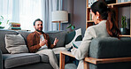 Happy man, patient and talking with therapist for counseling, rehabilitation or therapy session. Male person, client and speaking with counselor or psychologist for mental health or advice in office