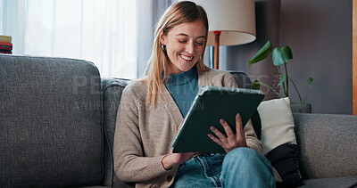 Buy stock photo Smile, reading and woman with tablet on couch, digital news article and social media break on weekend. Ebook app, browsing internet and person with tech in home, check email and subscription service