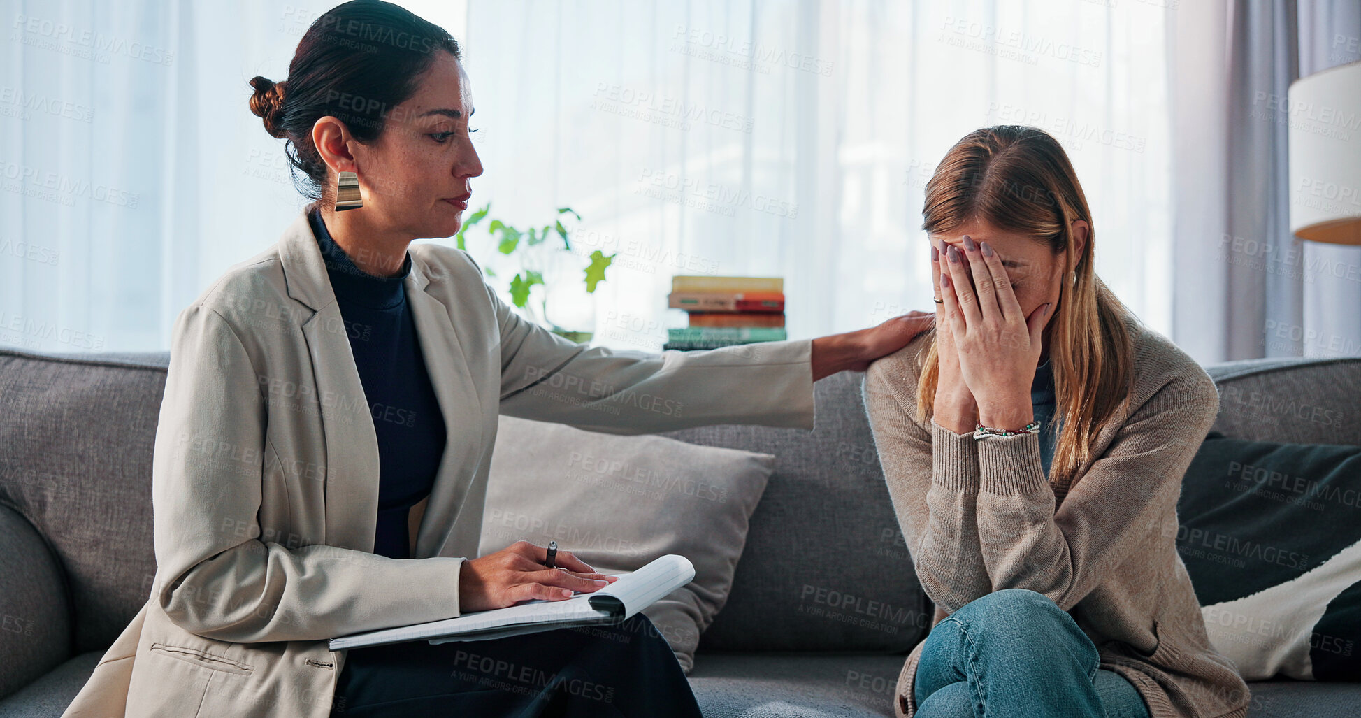 Buy stock photo Sad, woman and comfort with psychologist for counseling, emotional support and empathy. Grief, therapist and consoling patient with depression for compassion, trauma recovery and coping assistance