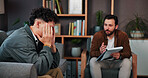 Mental health, grief or men in office with notebook, evaluation or frustration in clinic visit. Guidance, patient or psychologist with writing pad, trauma support or loss advice in therapy session.