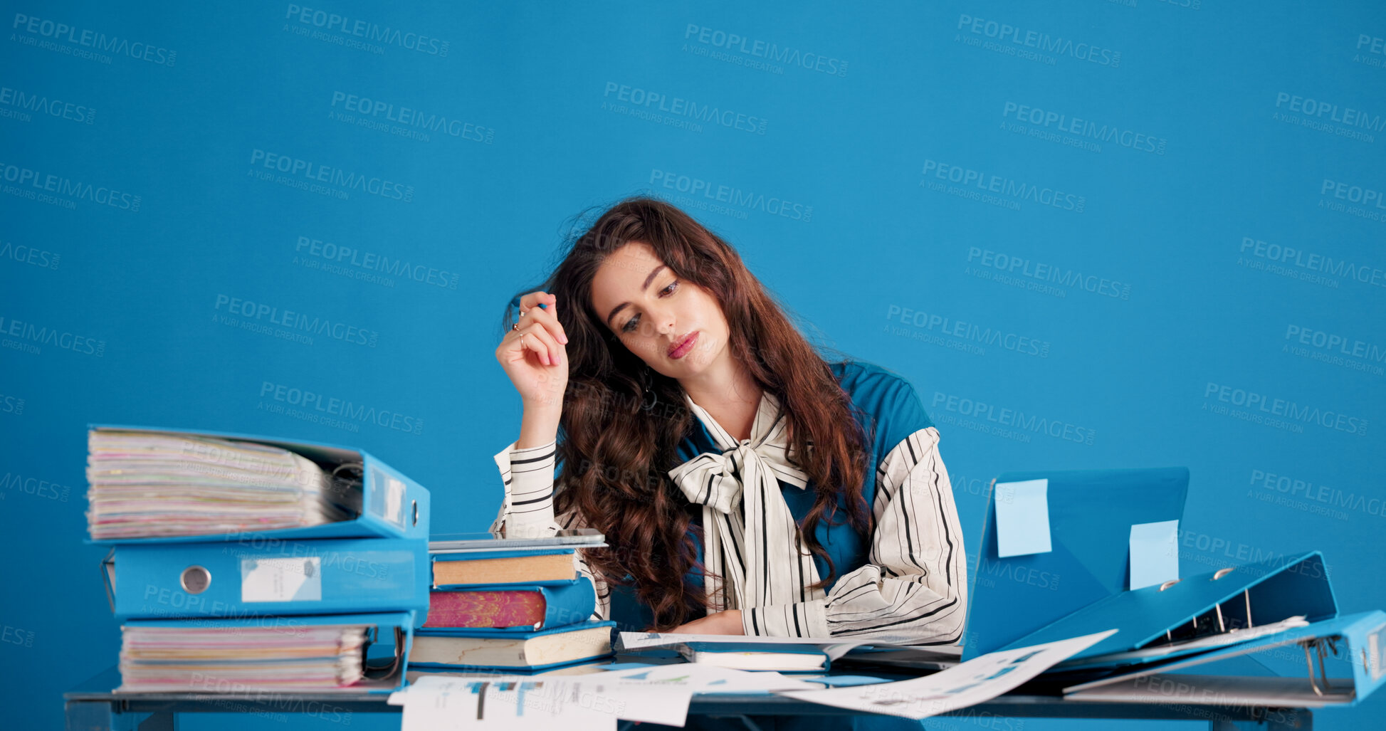 Buy stock photo Thinking, bored or woman in office with files, brain fog or tired of data analysis. Space, documents or finance consultant in creative studio with tech, task fatigue or budget report with burnout.