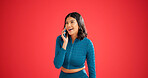 Woman, surprise and phone call for fitness in studio with contact, happy or mockup space on red background. Girl, smile and wow with smartphone, funny story and chat for gossip on break for exercise