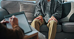 Hands, anxiety and man on sofa by psychologist for emotional support, help or advice on mental health. Nervous, notes and person with life coach for therapy, wellness or counseling session at clinic.
