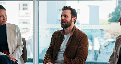 Buy stock photo Psychology, man and smile with talking in group therapy for healing, alcohol addiction or support. Rehabilitation, people and male member in counseling for relapse prevention, improvement or progress