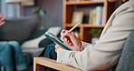 Consultation, therapy and hands with tablet, writing and session for recovery and mental health in clinic. Counselor, psychologist and person on sofa for trauma, diagnosis or conversation for help