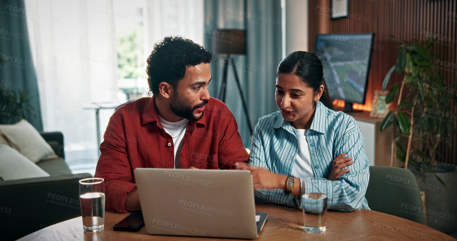 Buy stock photo Computer, conversation and couple in home with online banking for property investment, bills or mortgage. Technology, discussion and man with woman on laptop for loan application together in house.