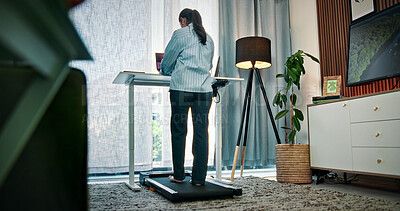Buy stock photo Walking, pad and back of woman for remote work, productivity and healthy habit for career. Wellness, freelance and person on treadmill with laptop for research, creative project and copywriting job