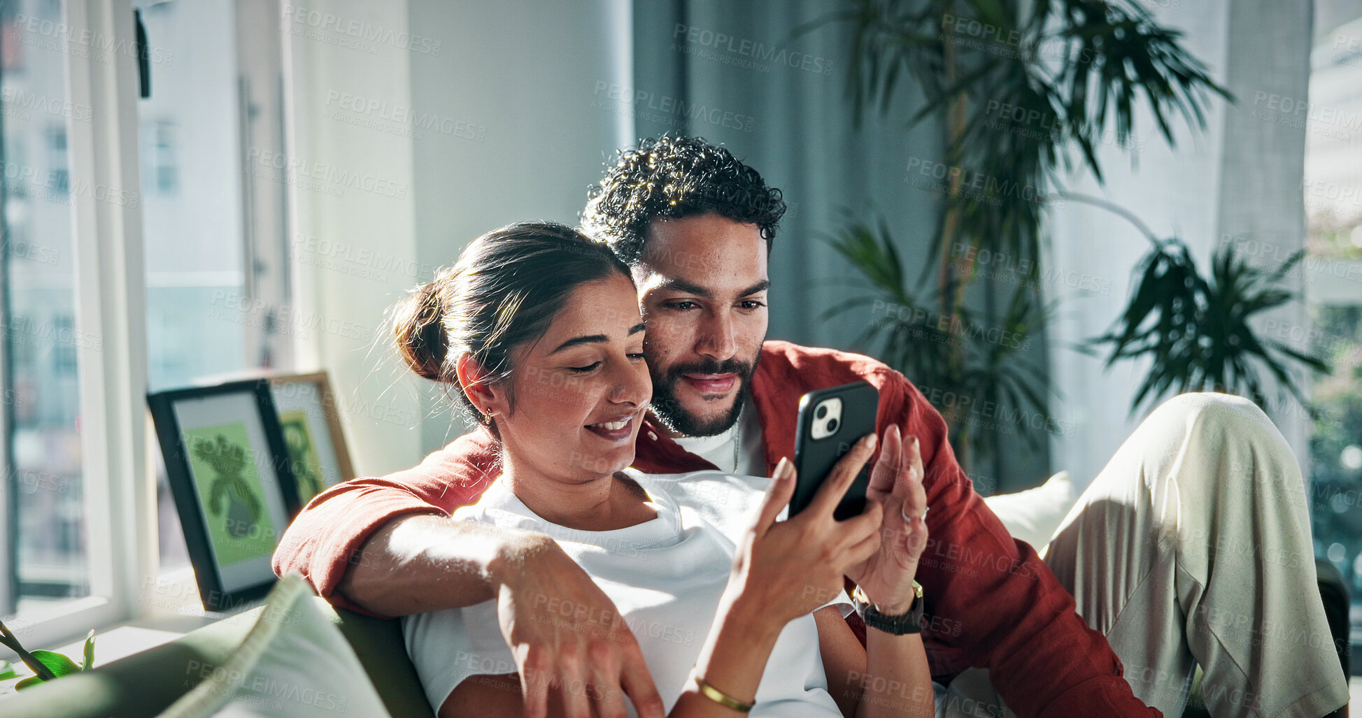 Buy stock photo Phone, relax and couple on sofa for social media, online networking and bonding on weekend. Marriage, happy and man with woman on smartphone for internet, browse website and connection in home