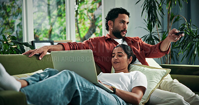 Buy stock photo Couple, relax and watching tv with laptop on sofa for online entertainment together in home. Man, woman or subscription with computer, remote or channel on couch for app, movie or news in house
