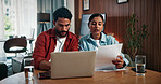 Couple, laptop and checking with documents for finance, investment or audit together in home. Man, woman or invoice with computer or paperwork for financial planning, budget cost or expenses in house