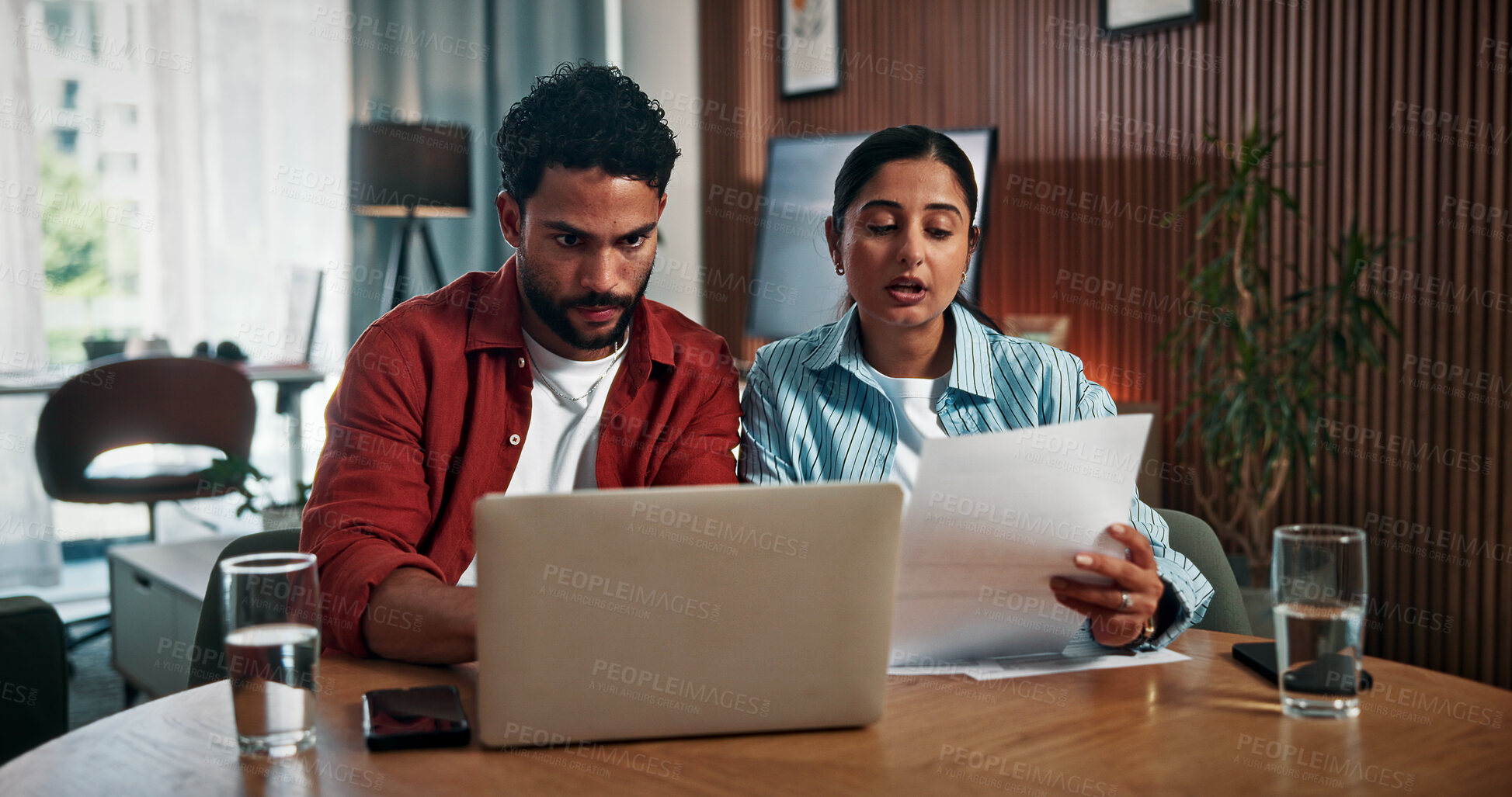 Buy stock photo Couple, laptop and checking with documents for finance, investment or audit together in home. Man, woman or invoice with computer or paperwork for financial planning, budget cost or expenses in house