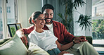 Love, happy and couple relax on sofa for bonding together, conversation and healthy relationship. Security, people and smile with affection in home for connection, weekend break and marriage loyalty