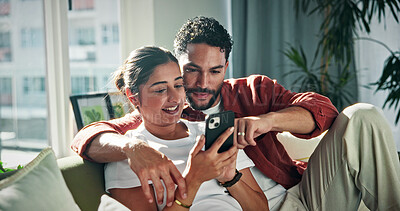 Buy stock photo Relax, talking and couple on sofa with phone for social media, networking and bonding on weekend. Marriage, happy and man with woman on smartphone to scroll internet, website and connection in home