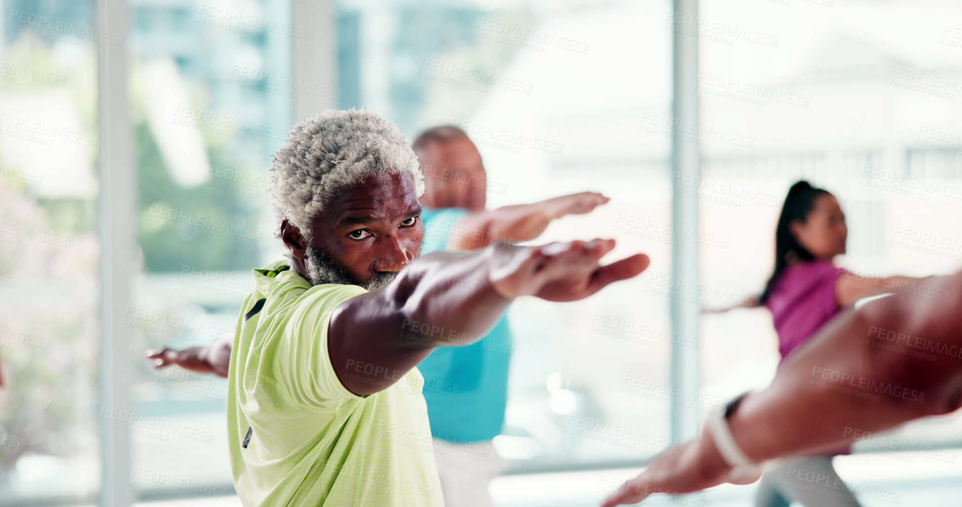 Buy stock photo Warrior pose, yoga and senior man in studio for fitness, wellness or exercise for balance. Health, yogi and elderly male person in retirement with stretching at group class for calm, relax or zen.