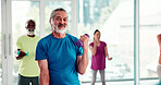 Senior, man and weightlifting with dumbbell in class for fitness, workout or exercise together. Elderly, group or team lifting with weight for physical activity, rehabilitation or arm training in gym