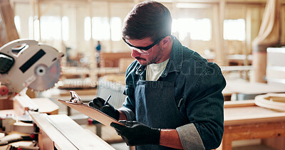 Buy stock photo Carpenter, man and writing in workshop with clipboard, industrial project and manufacturing inspection. Person, PPE and checklist in factory with woodwork evaluation, compliance and production notes.