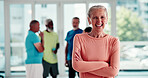 Arms crossed, fitness and portrait of woman in pilates class for health, training or wellness activity. Exercise, happy and satisfaction with excited senior person in studio for holistic vitality
