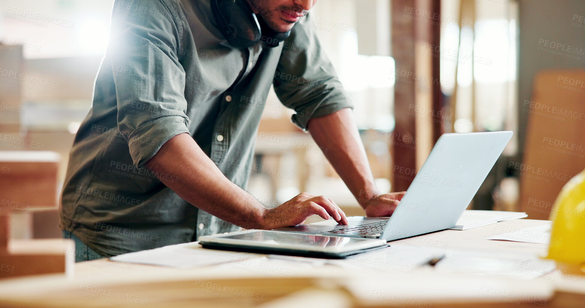 Buy stock photo Carpentry, planning and hands with laptop in workshop, creative project and digital rendition for craft. Flare, production inspiration and man with tech for woodwork info, check deadline and research