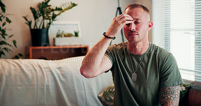 Buy stock photo Relax, eft and breathing with man on sofa in home for ptsd treatment, mental health and war veteran. Pressure point, soldier trauma release and army deployment with person tapping in living room