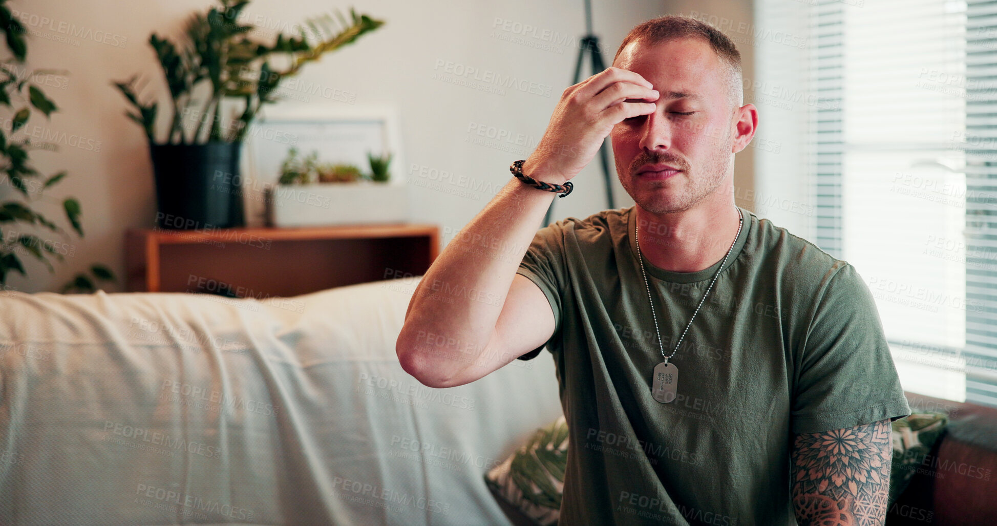 Buy stock photo Relax, eft and breathing with man on sofa in home for ptsd treatment, mental health and war veteran. Pressure point, soldier trauma release and army deployment with person tapping in living room