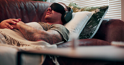 Buy stock photo Headphones, therapy or man with blindfold on couch, sensory deprivation or anxiety counseling technique. Relaxation training, psychology or person with mindfulness for ptsd, therapeutic audio or tech