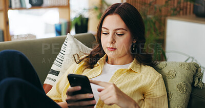 Buy stock photo Woman, relax and scroll with phone at house for social media, browsing website and chatting. Female person, reading and mobile for text message, communication and online notification in living room