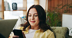 Happy, woman and relax with phone at house for social media, browsing website and chatting. Smile, female person and reading with mobile app for text message, communication and online notification
